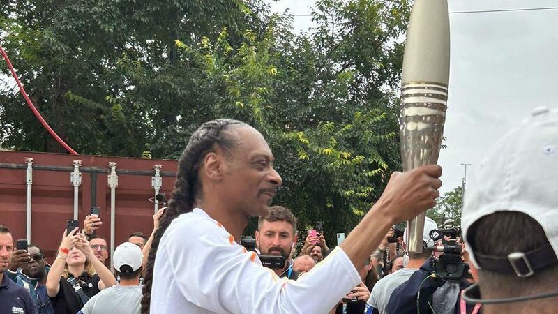 Snoop Dogg Carries Olympic Torch A Few Hours Before the Paris Games Opening Ceremony