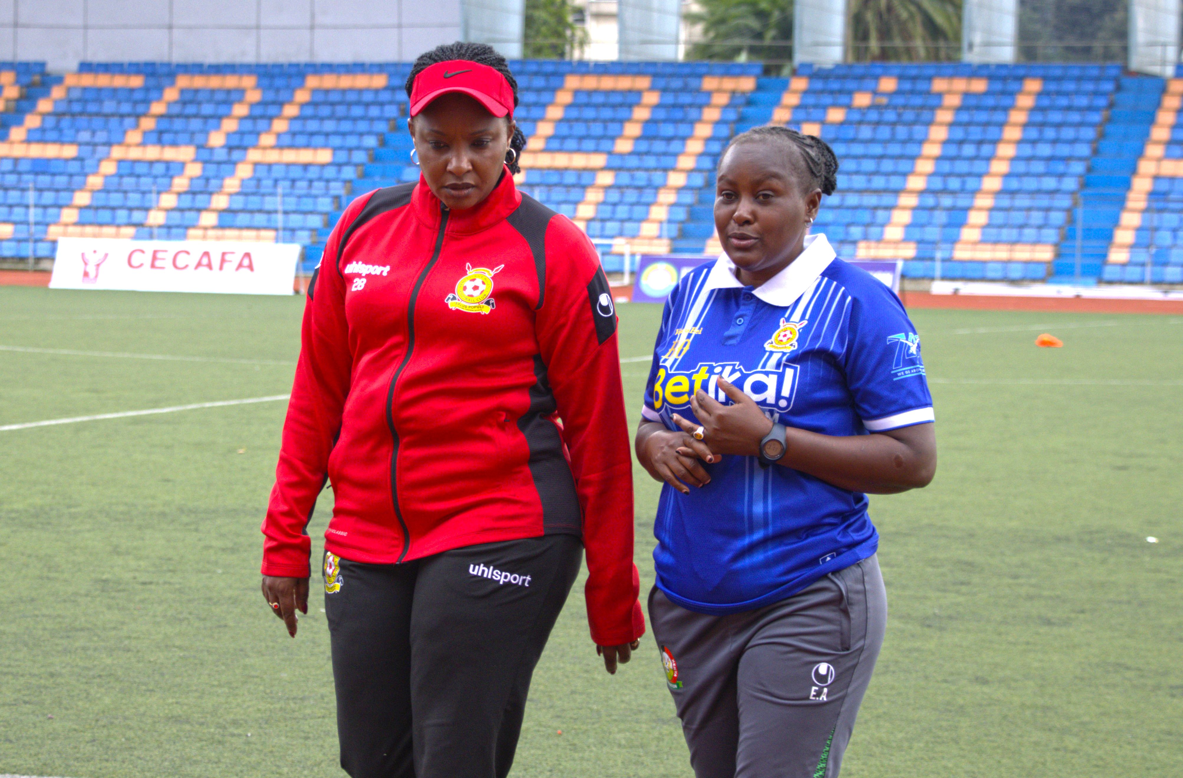 Coach Beldine Odemba (right) with Police Bullets Team Manager