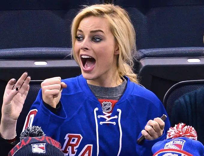Margot Robbie she cheers on the New York Rangers at an ice hockey